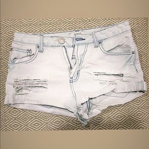 Distressed denim shorts